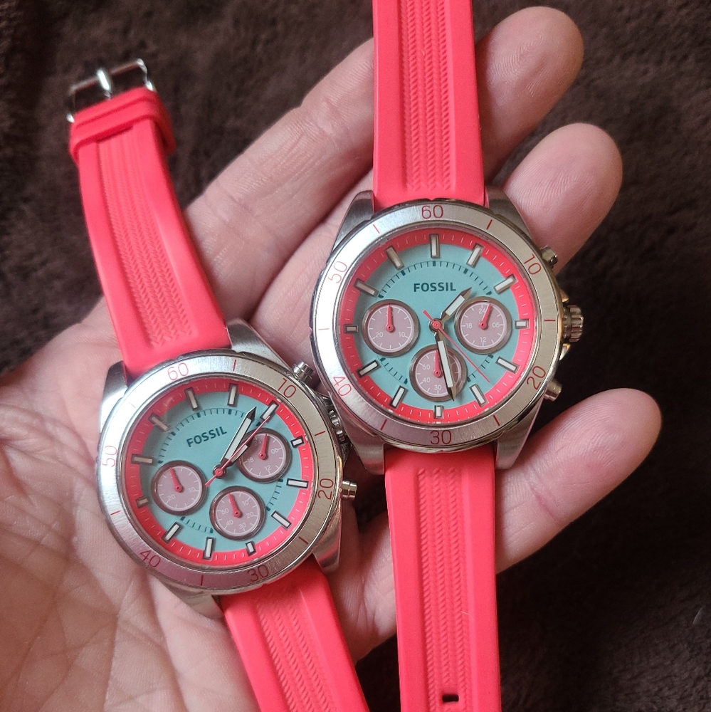 Fossil pink and turquoise watches. Excellent condition. Need batteries.